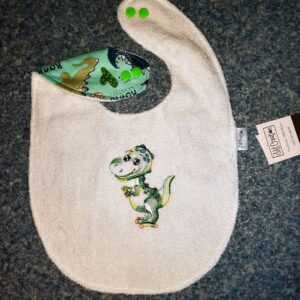 Bavoir brodé personnalisé dinosaure